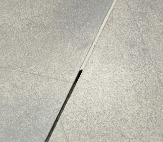 Peeling Grout